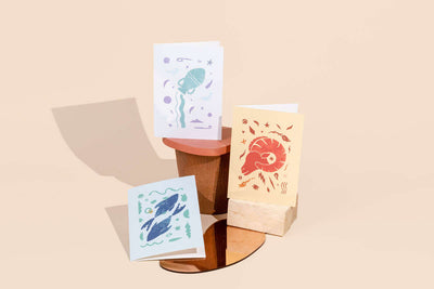 Pisces astrology greeting card showcased with other cards from the astrology card collection
