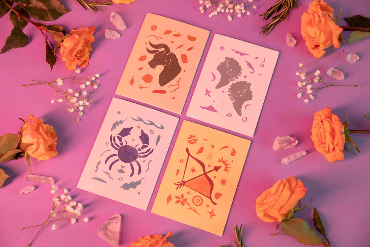 set of four astrology greeting cards including taurus, Gemini, cancer, and Sagittarius. 