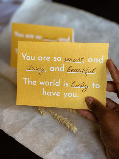 Yellow Greeting Card says "You are so smart, and strong, and beautiful. The world is lucky to have you"