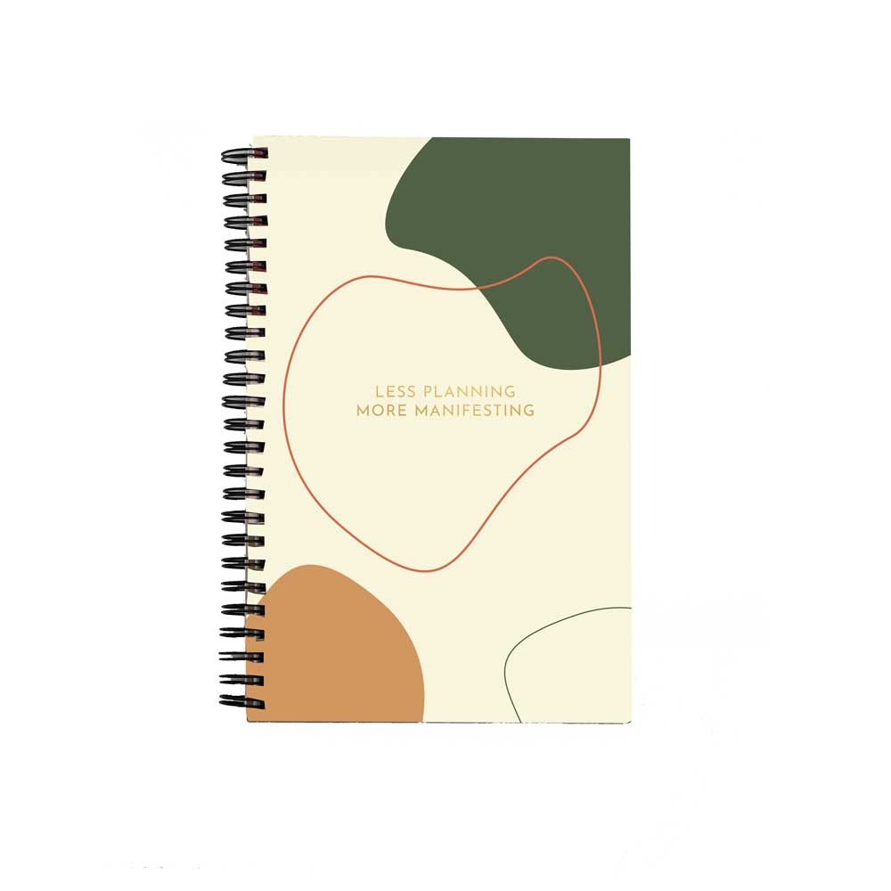 manifestation journal with abstract designed cover that reads "less planning more manifesting"