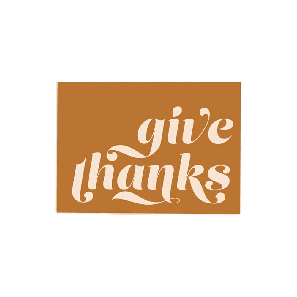 horizontal orangish brown give thanks card that reads "give thanks" in big white bold font