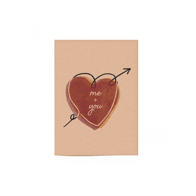 beige and pink colored "Me & You Romance Card" with a heart illustration and within the heart the text reads "Me + You"