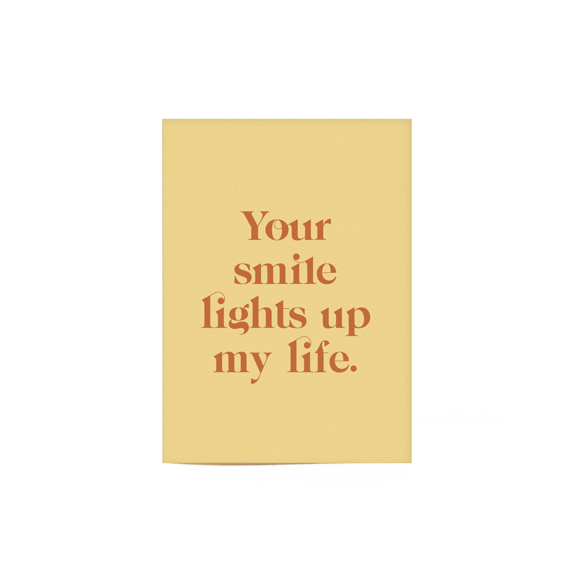 yellow smile lights up my life card that reads "Your smile lights up my life" in brownish orang text